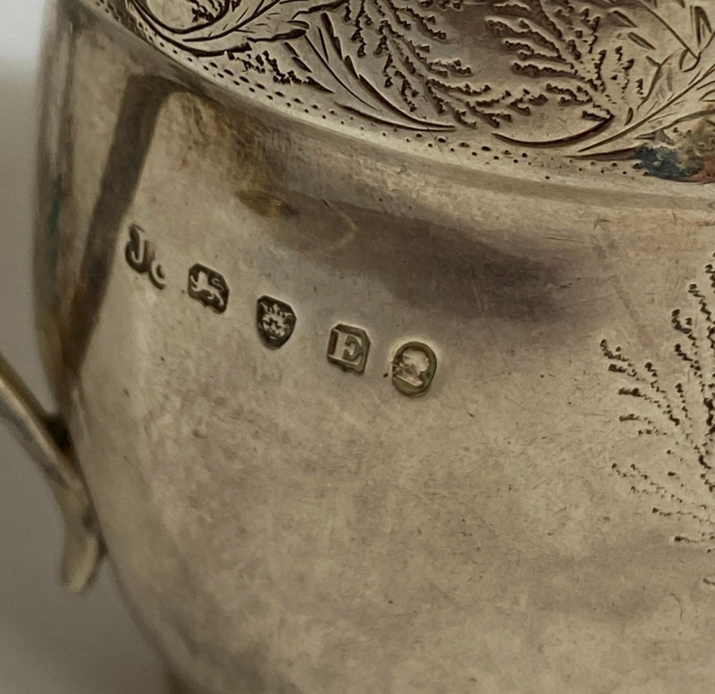 Close-up of antique silver hallmarks